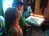 Happy Sweet 16 to Bella being present her b’day cake by dad Barry, owner/chef of Bourbon St. photo by Larry Testerman